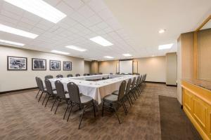 a conference room with a long table and chairs at Best Western Voyageur Place Hotel in Newmarket