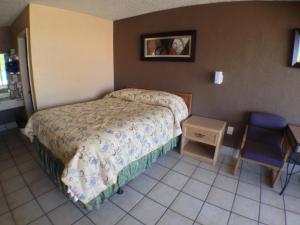 Postel nebo postele na pokoji v ubytování Budget Inn Motel