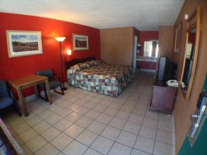 Postel nebo postele na pokoji v ubytování Budget Inn Motel