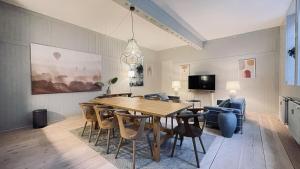 a dining room with a table and chairs at ApartmentInCopenhagen Apartment 1577 in Copenhagen