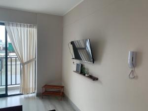 Televizorius ir (arba) pramogų centras apgyvendinimo įstaigoje Apartamento de estreno en Centro de Lima "Gina's cozy Home"