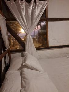 Voodi või voodid majutusasutuse Hotel Gabarra Lodge toas