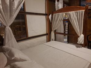 Voodi või voodid majutusasutuse Hotel Gabarra Lodge toas
