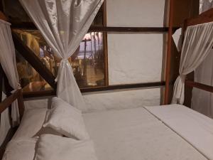 Voodi või voodid majutusasutuse Hotel Gabarra Lodge toas