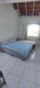 เตียงในห้องที่ kitnet praia no Anil Angra dos reis