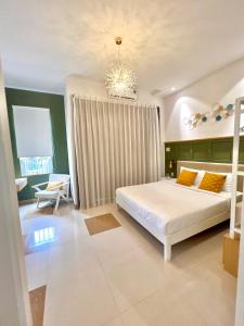 Katil atau katil-katil dalam bilik di Kata Home Central +19 gambar