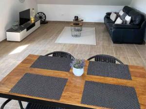 Area tempat duduk di Apartment for 4 people, in the heart of Alsace