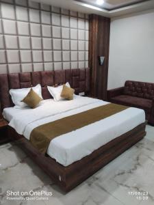 Letto o letti in una camera di Hotel Praj Paradise