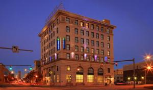 a tall building with lights on the side of it at Holiday Inn Express Baltimore-Downtown, an IHG Hotel in Baltimore