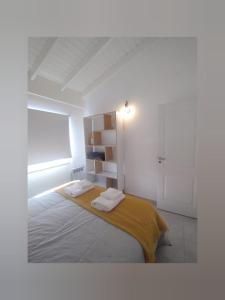 Ένα ή περισσότερα κρεβάτια σε δωμάτιο στο Apart Las Victorias