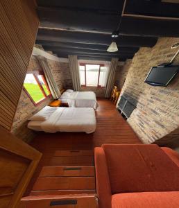Postel nebo postele na pokoji v ubytování Hotel Refugio Santa Ines
