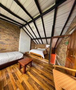 Postel nebo postele na pokoji v ubytování Hotel Refugio Santa Ines