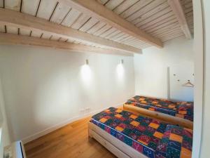 a bedroom with two beds in a room at Casa L'Armentera, 3 dormitorios, 6 personas - ES-89-123 in Ventalló