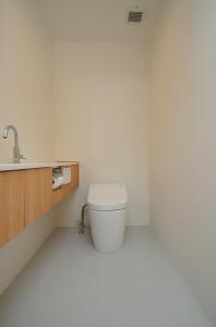 a bathroom with a toilet and a sink at BHOLIC（ビーホリック） in Shimonoseki