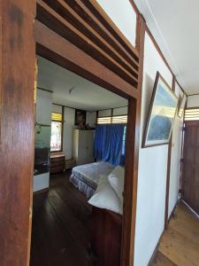 Katil dua tingkat atau katil-katil dua tingkat dalam bilik di Villa Kana