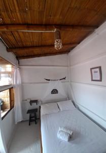 Voodi või voodid majutusasutuse Hotel Gabarra Lodge toas