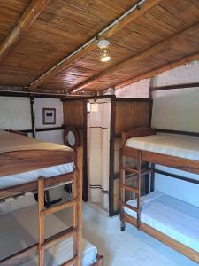 Voodi või voodid majutusasutuse Hotel Gabarra Lodge toas