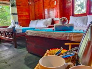 Postel nebo postele na pokoji v ubytování Ceylon Amigos Eco Resort