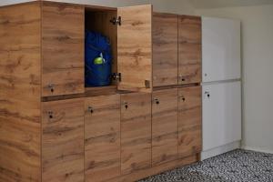 a room with wooden chests of drawers at Lama Hostel in Ivano-Frankivsk