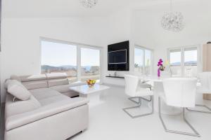 Телевизор и/или развлекательный центр в Apartment Royal