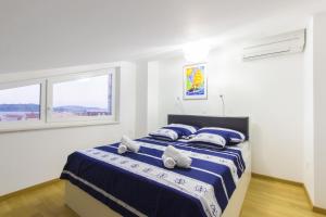 Кровать или кровати в номере Apartment Royal