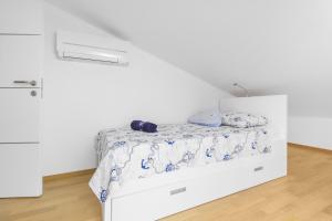 Кровать или кровати в номере Apartment Royal