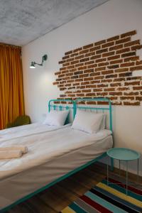 Postel nebo postele na pokoji v ubytování Hotel Arevi Gosh