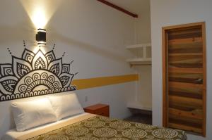 Letto o letti in una camera di Hotel Axolotl