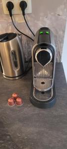 Příslušenství pro přípravu čaje a kávy v ubytování Gîte de Trasenster