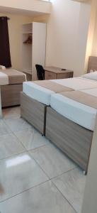 Postel nebo postele na pokoji v ubytování Allegro Hotel