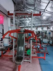 a gym with a slide in a gym at QUICKSHIELD HOMESTAY in Naga