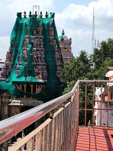 a roller coaster ride in front of a temple at LA villa Rani in Madurai