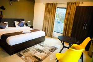 Konfudha Resort客房内的一张或多张床位
