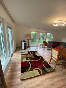 a living room with a rug on the floor at Es ist ein sehr schönes Haus in Raunheim