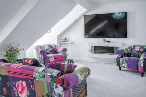 Et tv og/eller underholdning på The Penthouse - Luxury 1 Bed - Panorama - Tenby