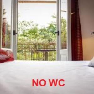 Postel nebo postele na pokoji v ubytování Hotel RossoVino Milano