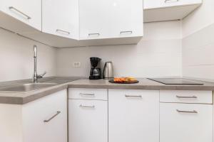 Kuchyňa alebo kuchynka v ubytovaní Apartments Lacrima