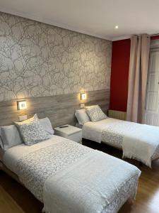 Hostal New Dream Madrid客房内的一张或多张床位