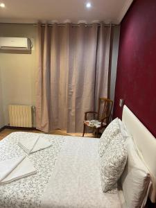 Hostal New Dream Madrid客房内的一张或多张床位