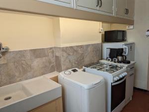 Una cocina o kitchenette en Ozé jpas