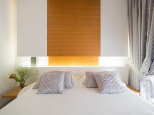 Postel nebo postele na pokoji v ubytování Precise House Montaperti Siena