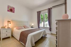 Postel nebo postele na pokoji v ubytování Villa Bellavista Calpe