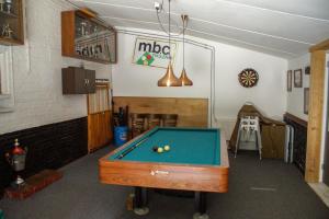 a billiard room with a pool table in it at Camping Gorishoek in Scherpenisse