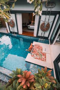Bazén v ubytování Anantara Mai Khao Phuket Villas nebo v jeho okolí