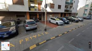 a group of cars parked in a parking lot at CasAgnese Sanremo in Sanremo