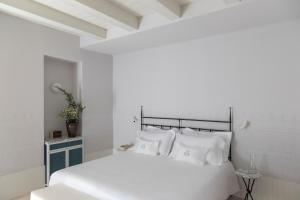 Llit o llits en una habitació de Hotel Le Dune Piscinas