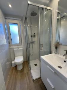 Et badeværelse på Apto reformado a 20 mins de la playa + 14 billeder