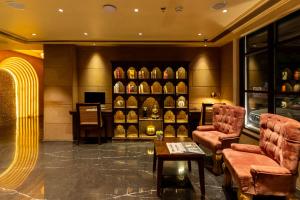 a room with a store with shelves of wine bottles at Historia Royal in Udaipur