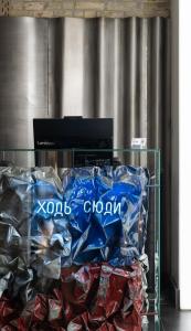a glass table with a sign that says zoom clans clan at BURSA Hotel Kyiv in Kyiv