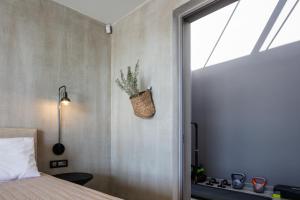 Postel nebo postele na pokoji v ubytování Kumo Villas